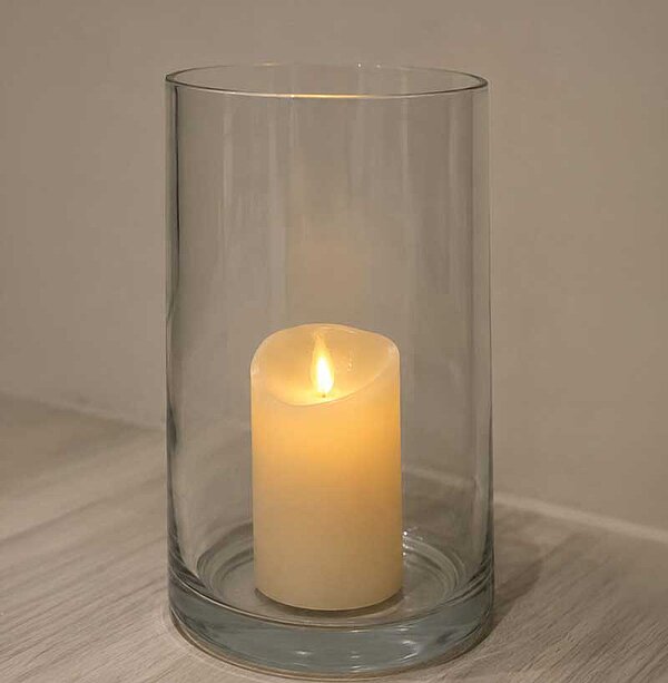 Memorial candle in a glass lantern symbolising remembrance, comfort and a peaceful farewell.